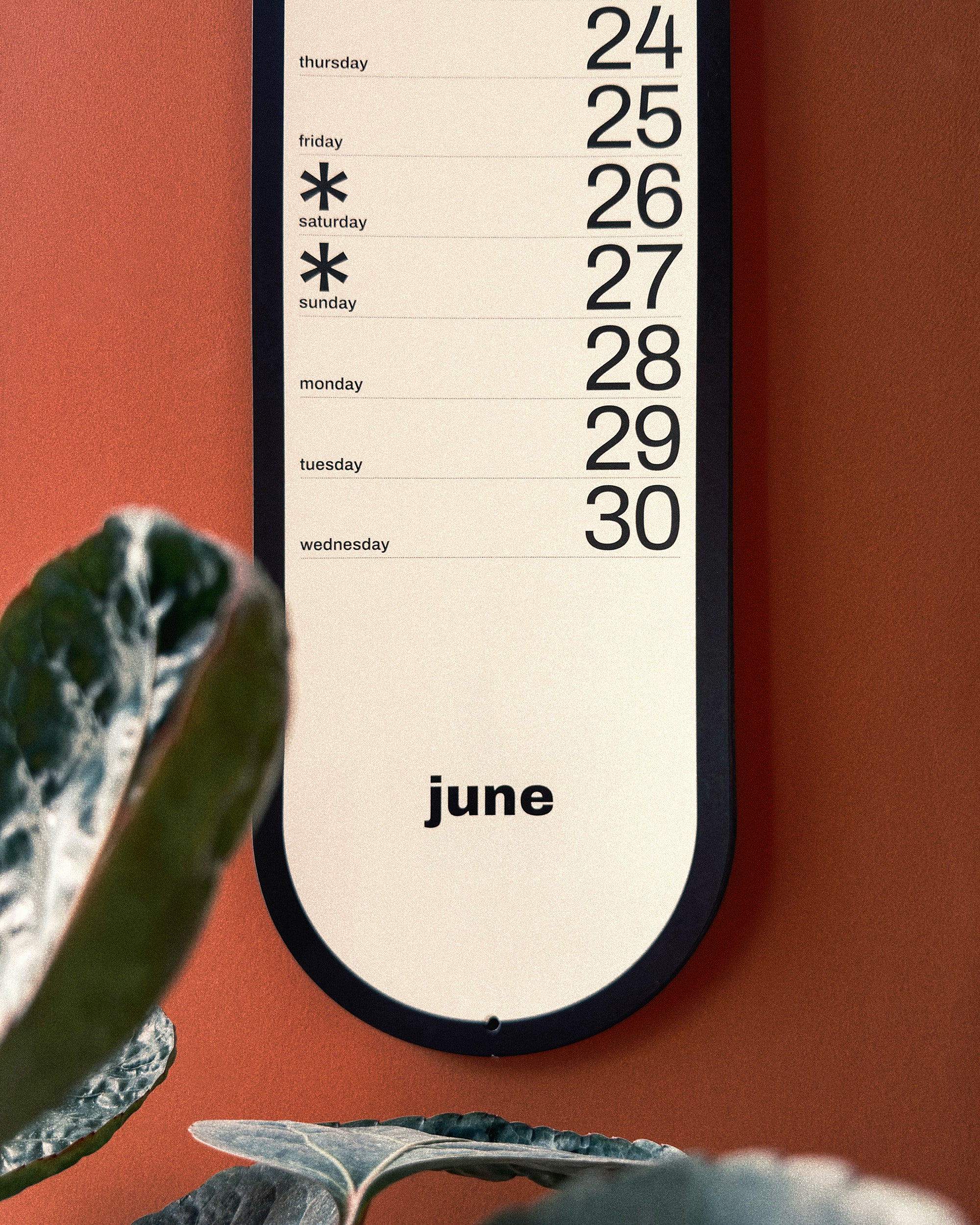 Calendar with June dates on a red background